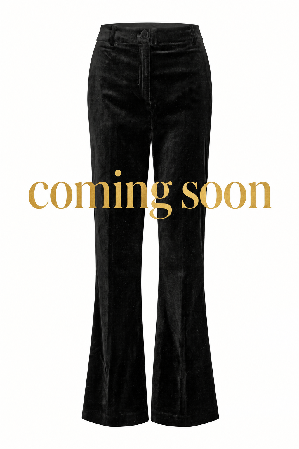 Black trousers with large gold “coming soon” lettering across the centre