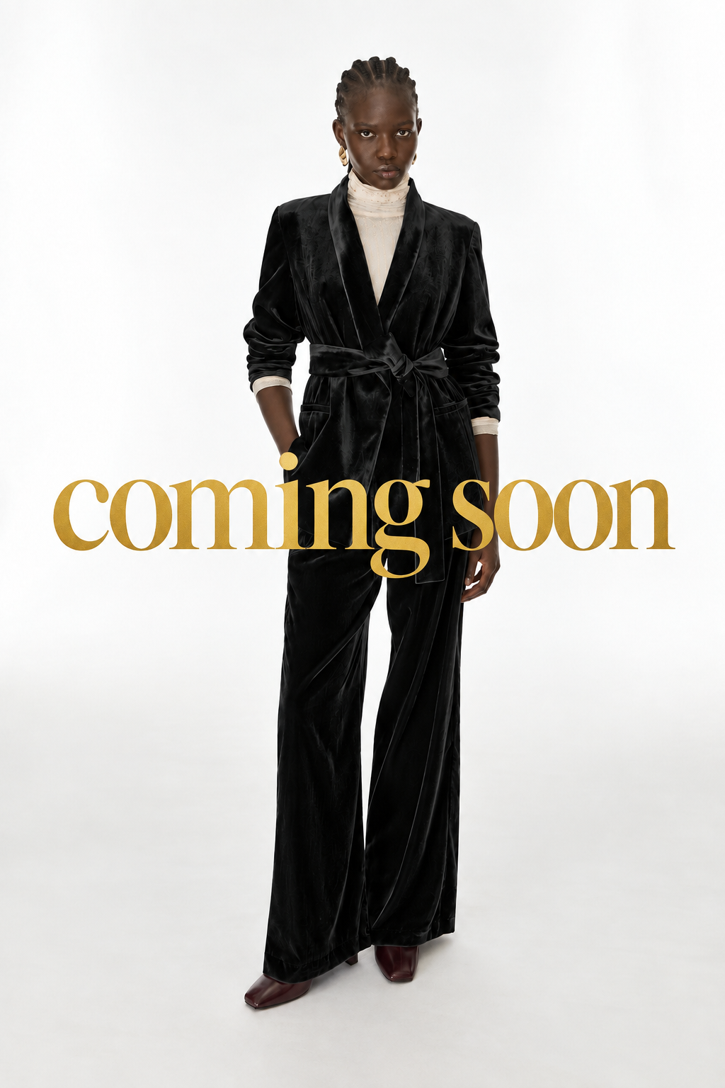 Image with large gold “coming soon” lettering centred across the middle